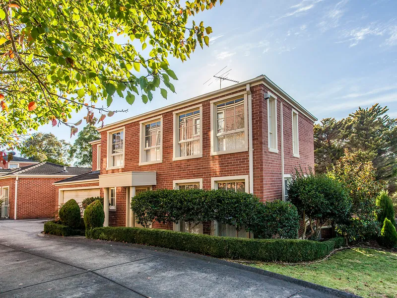 This Townhouse Is Sure To Impress!