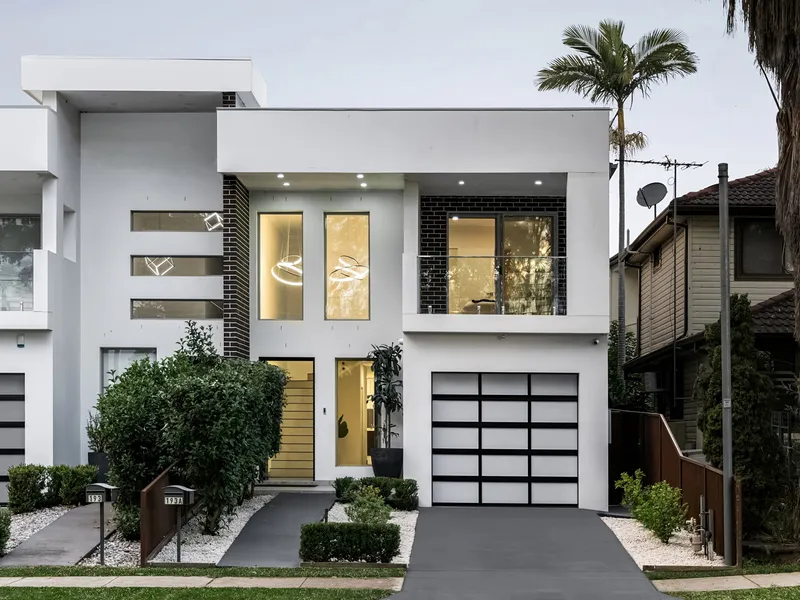 Near new modern full double brick duplex offering family living in a central and leafy location