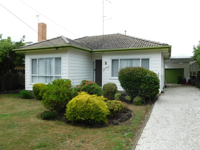 THREE BEDROOMS, ONE LIVING AND HOME OFFICE OR RUMPUS ROOM.