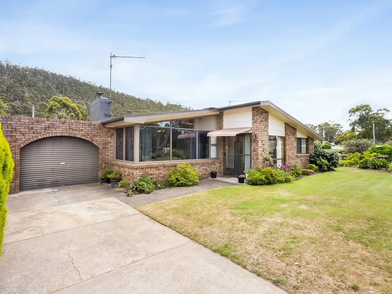Pristine home a stone's throw from the water's edge with 2 street frontages.
