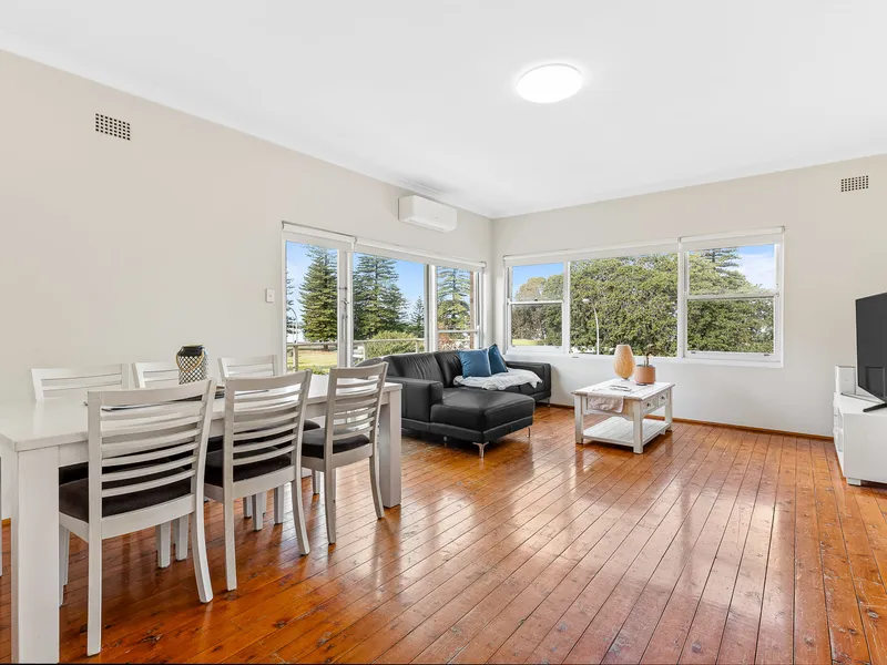 Partially furnished three bedroom bayside apartment