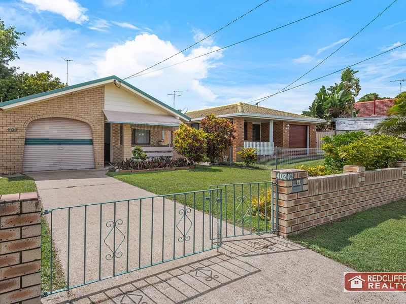 GREAT LOCATION for this BRICK & TILE BEAUTY…