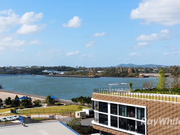 Private East Facing Balcony with River & Gateway Views