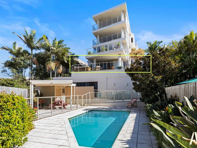 Prestigious Apartment with Expansive Terrace in Beachside Location