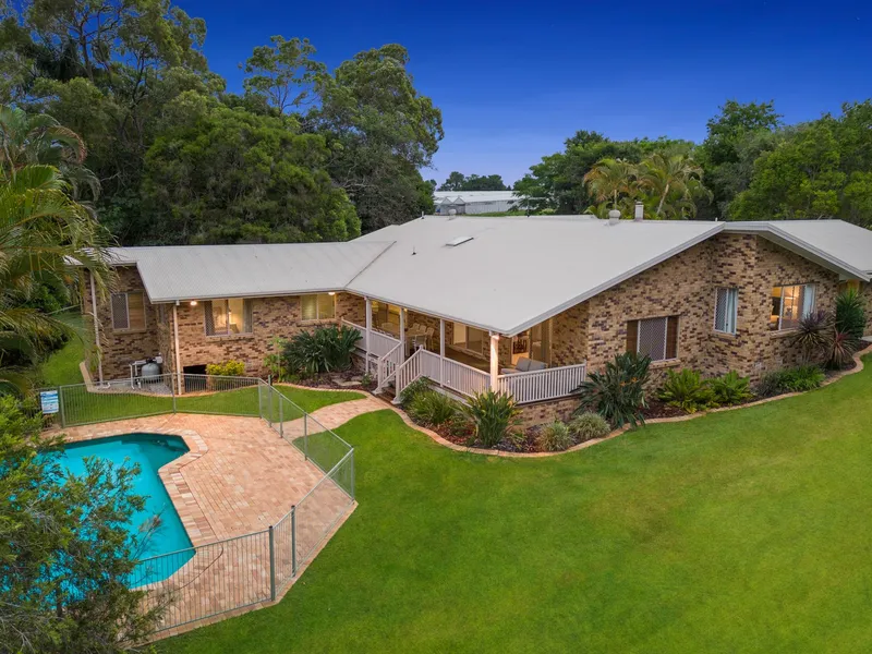 Unique acreage property with pool and large shed