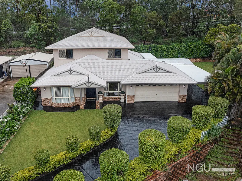 HUGE 51 SQUARE EIGHT (8) BEDROOM, FOUR (4) BATHROOM EXECUTIVE FAMILY HOME THAT IS BIG ENOUGH FOR TWO (2) FAMILIES!