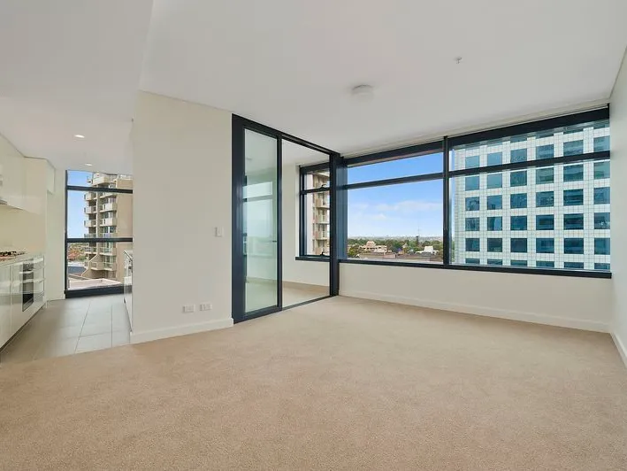 Stunning High Level Modern One Bedroom Plus Study Apartment With Car Space Located In The Ultimate Convenience - Metro Residences