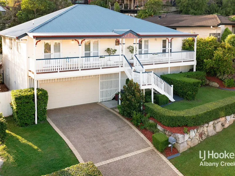 Modern Queenslander with divine suburban outlook + alfresco + pool!