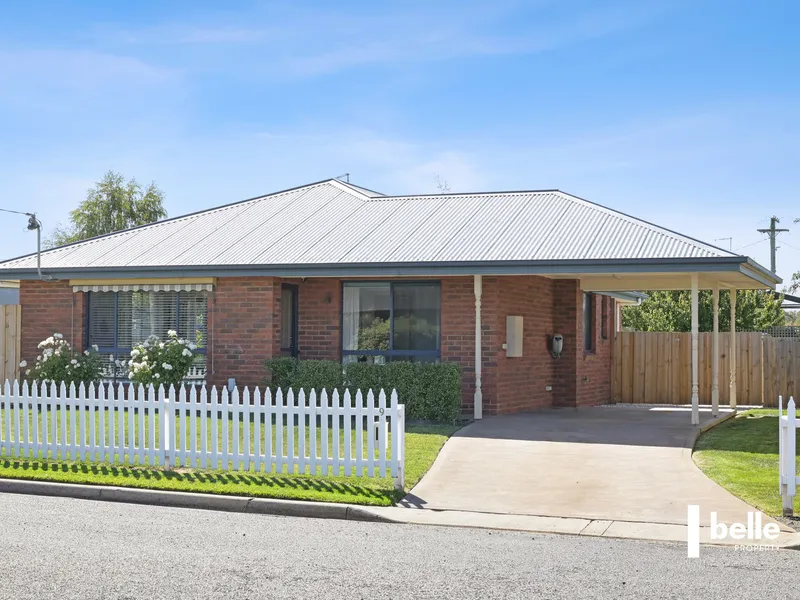 Immaculate Brick Haven Awaits Your Welcome