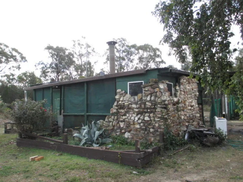 STONE & MORTAR COTTAGE ON 38.94 ACRES