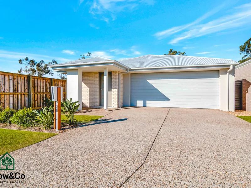 FAMILY HOME WITH FULLY FENCED BACK YARD