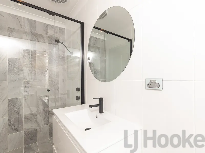 Tastefully Renovated with Side Access