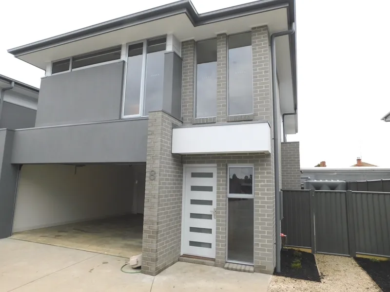 LOW MAINTENANCE FOUR BEDROOM TOWNHOUSE