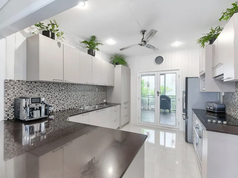 POOL... AIR-CONDITIONING... QUIET STREET... MODERN KITCHEN... UPSTAIRS/ DOWNSTAIRS LIVING...