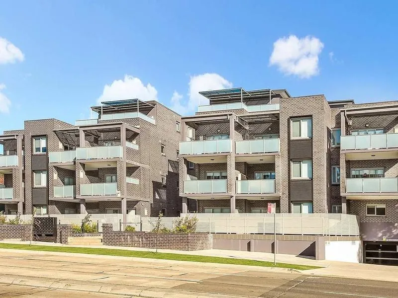 MODERN 1st FLOOR AIR CONDITIONED UNIT WITH LARGE BALCONY AND SECURE PARKING!