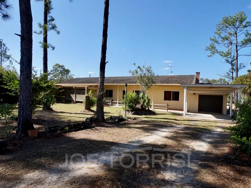 PEACEFUL ACREAGE LIVING WITH EXTENDED FAMILY OPTIONS