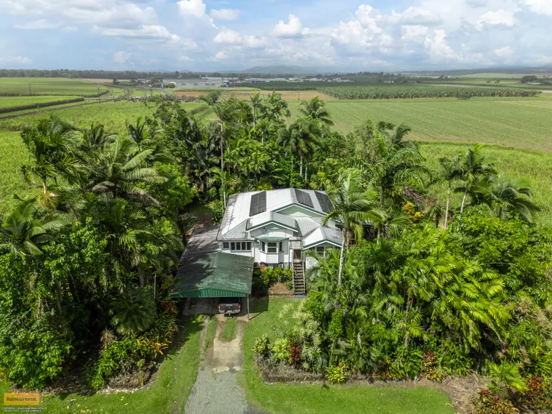 Queenslander Style Home Nestled in Secluded Tropical Gardens