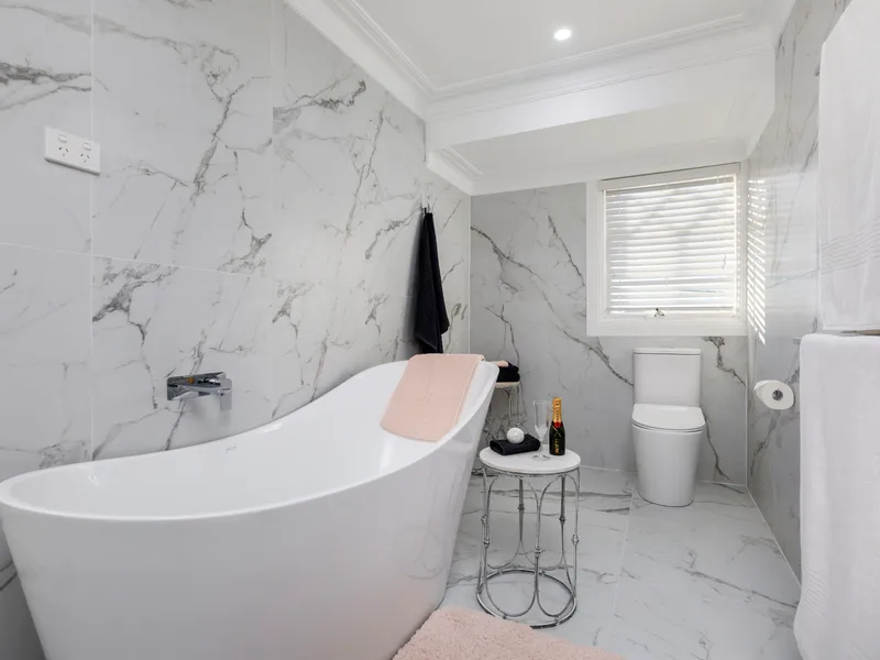 Elegant luxury residence offers opportunity for extended family and the ability to work from home in style!