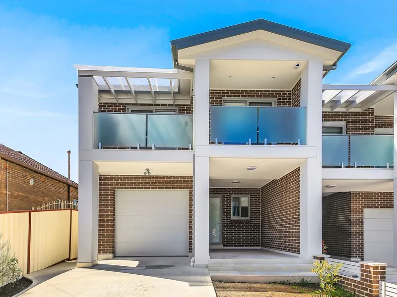 NEWLY BUILT DESIGNER FULL BRICK DUPLEX
