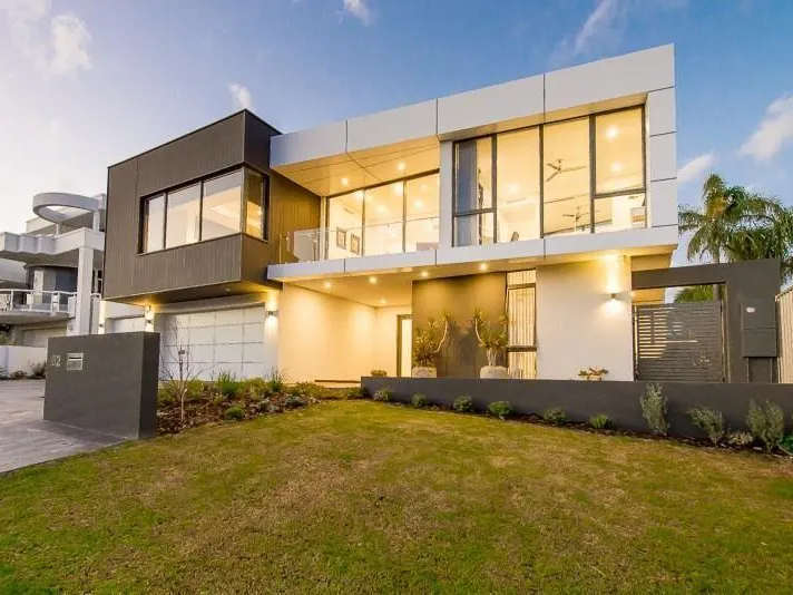 THIS OPULENT HOME WITH PICTURESQUE CITY VIEWS IS FUTURISTIC AND DRAMATIC