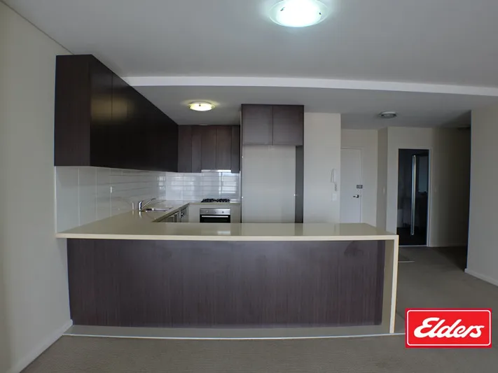 Stylish apartment home with massive open plan kitchen.