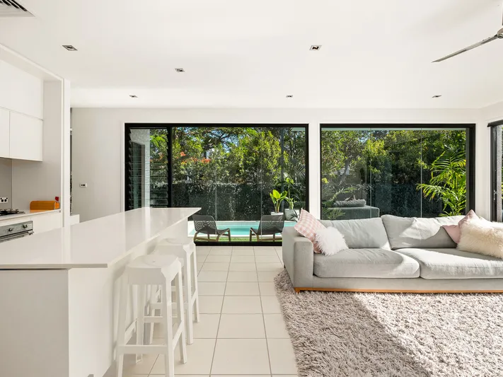 Sophisticated light-filled home surrounded by pools, parks, gardens, and cafes