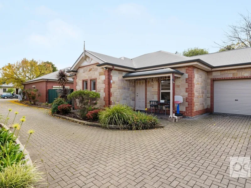 Stone-fronted courtyard beauty with a breezy lifestyle in mind