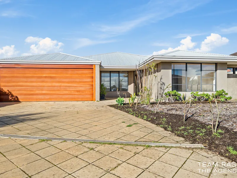Experience the Perfect Family Lifestyle at 61 Araluen Crescent