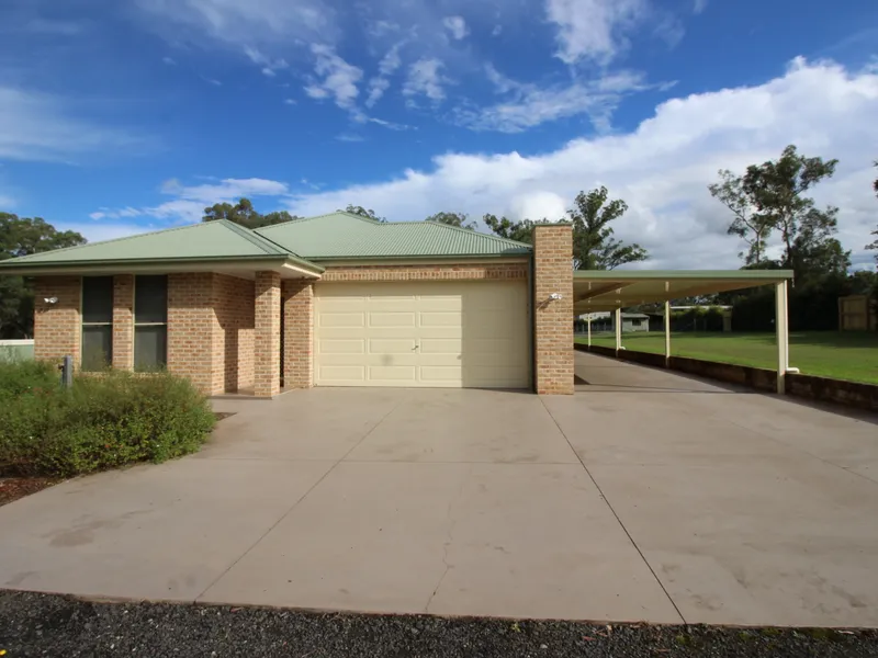 1.5 acres withFour Bedroom home, theatre room, ducted air conditioning, double garage, large covered entertainment area on approx. 1.5 acres.