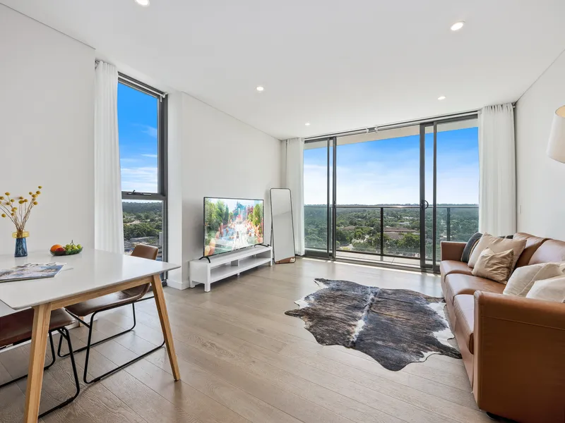 Chic 2-bed living on Epping's twelfth floor: 'Vista Tower' in Oxford Central, sleek design, natural light, and stunning views