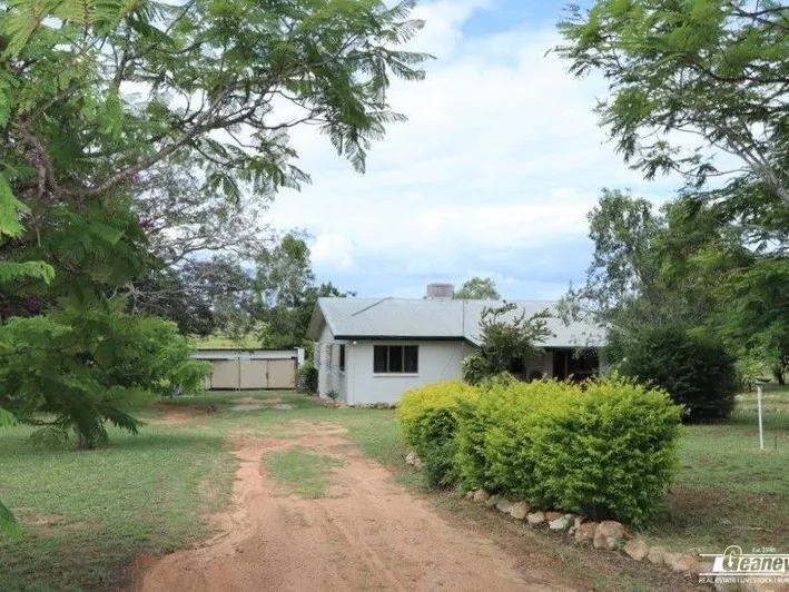BLOCK HOME ON 20 ACRES