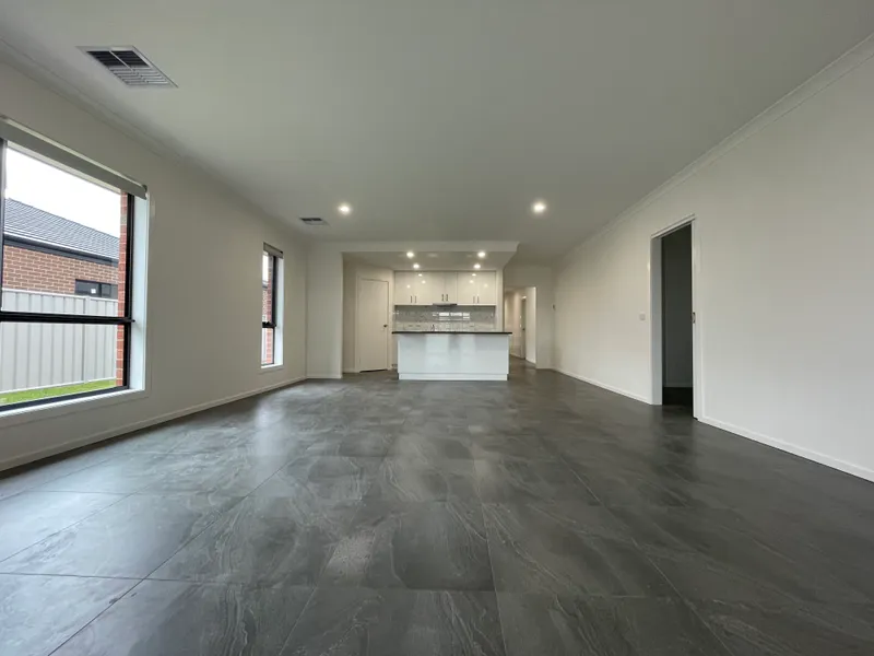 BRAND NEW FOUR BEDROOM HOME - LOW MAINTENANCE!