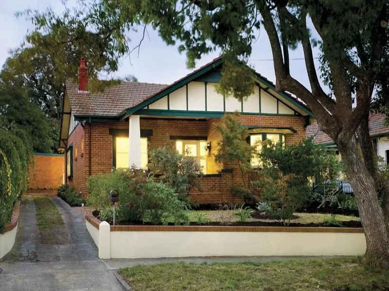 Family Home In Treelined Street