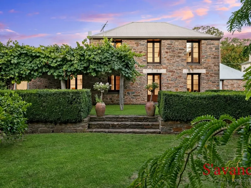 Architectural 2 storey stone residence.