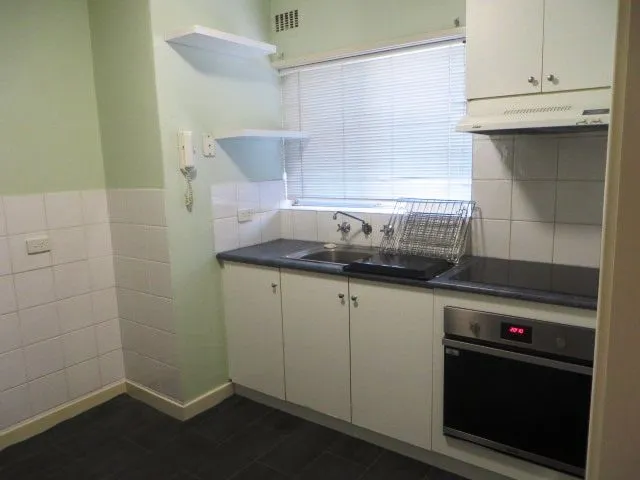 SPACIOUS UNIT IN QUIET COMPLEX