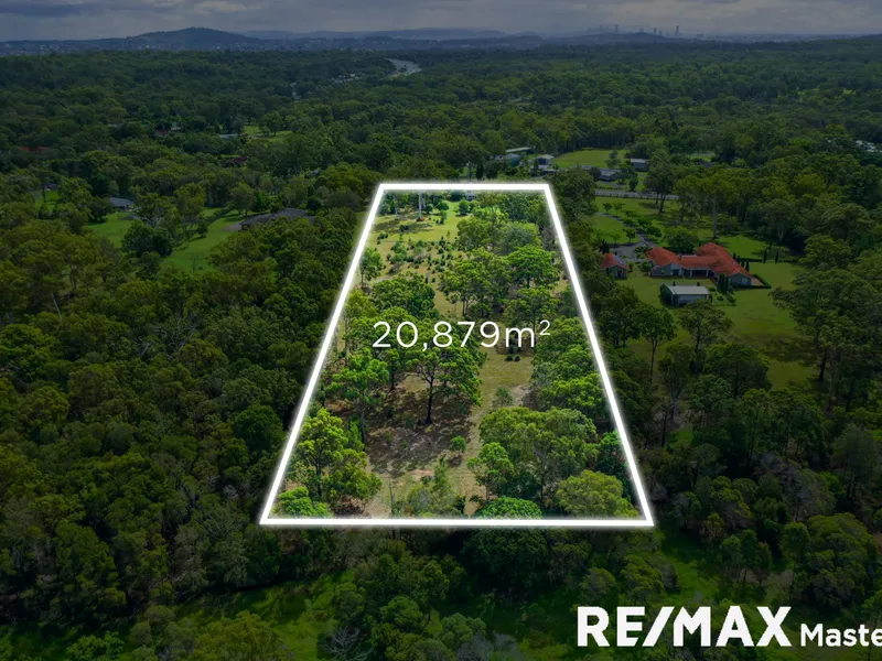SOLID FAMILY HOME | INCREDIBLE ACREAGE OPPORTUNITY IN AN ELEVATED & PREMIUM LOCATION!
