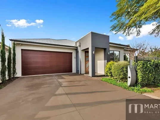 JUST THE MOST ATTRACTIVE AND PLEASANT FAMILY HOME