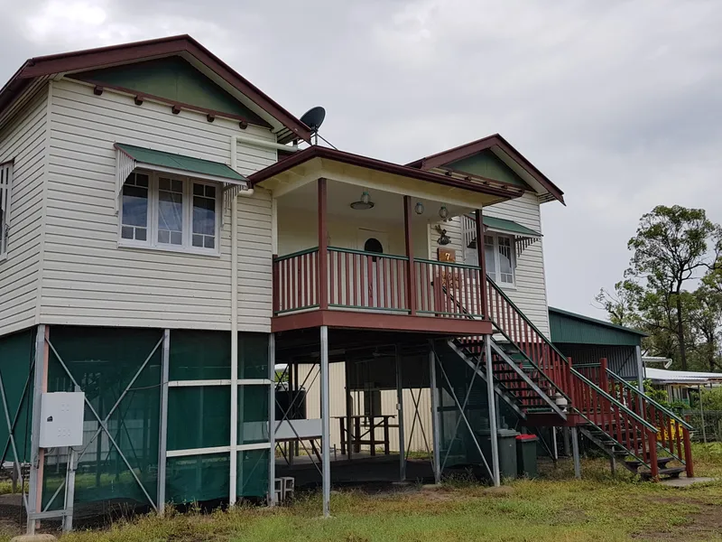 Charming three bedroom timber beach house on a large block one street from the beach