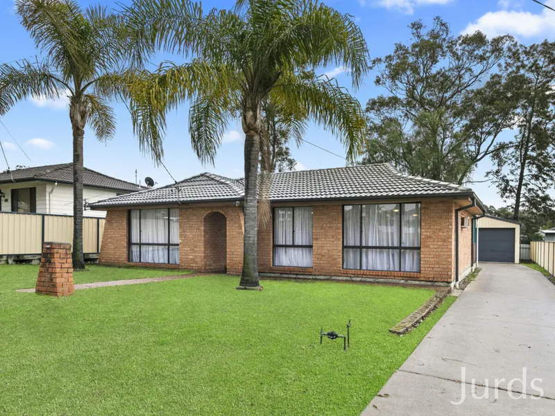 3-bedroom brick home, convenient location and a huge shed!