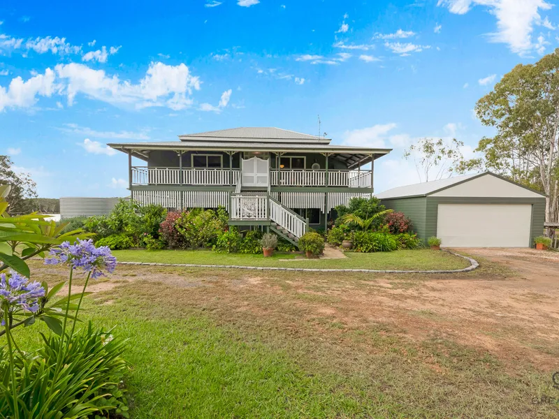 STUNNING QUEENSLANDER WITH LAKE ON 63 ACRES