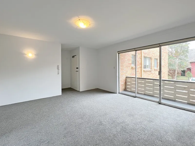Brilliant village location - refreshed 2 bedroom with garage