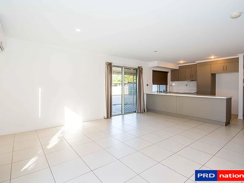 MODERN TOWN HOUSE IN GATED COMPLEX CONVENIENTLY LOCATED