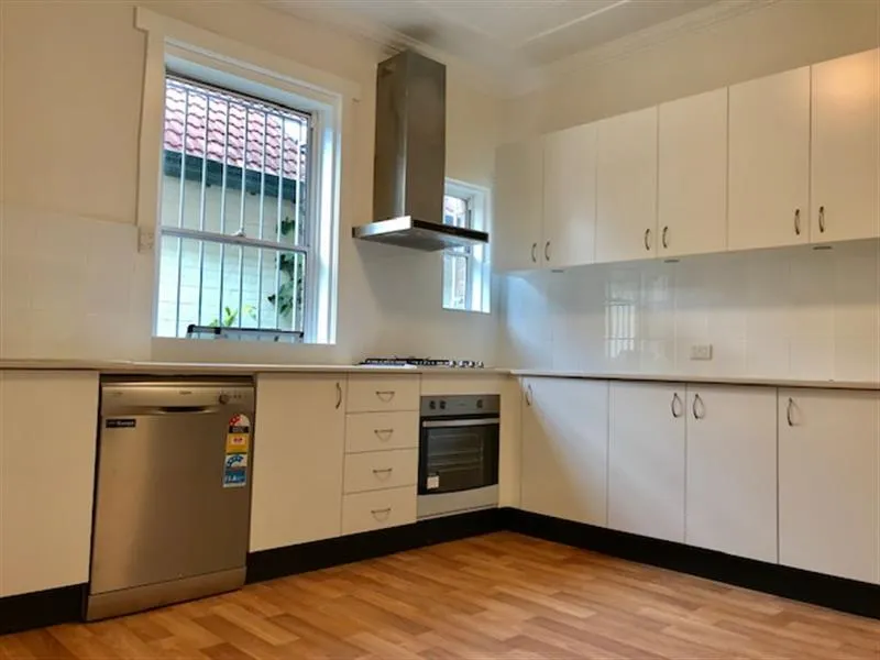 COMPLETELY RENOVATED LARGE THREE BEDROOM GARDEN APARTMENT