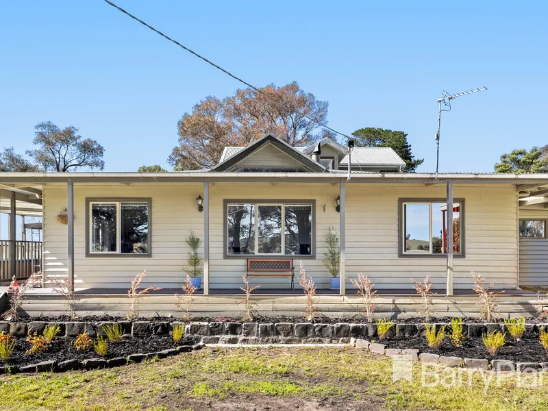 Family home with shedding and space in a rural setting.