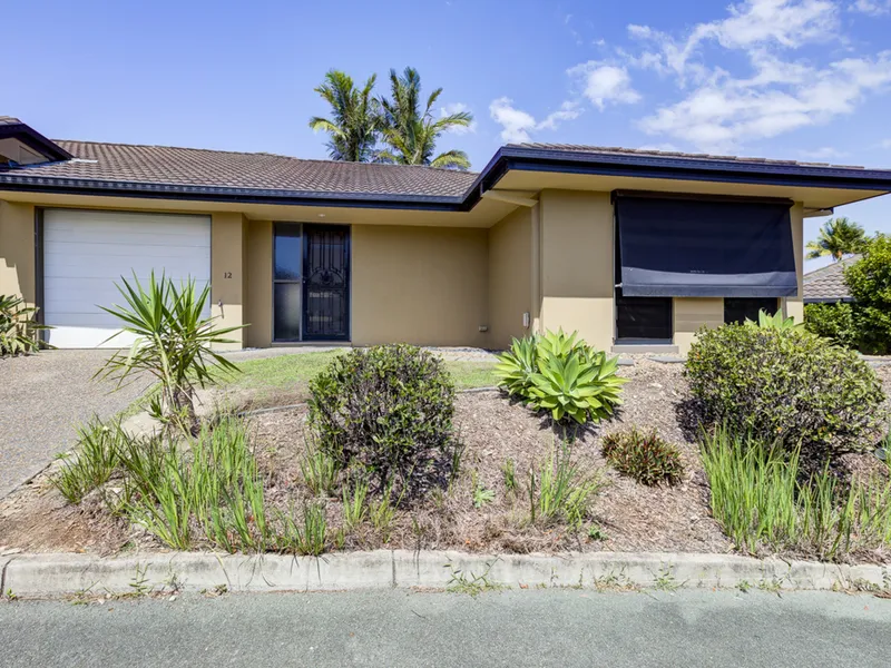 GATED LIVING IN THE HEART OF PACIFIC PINES!!