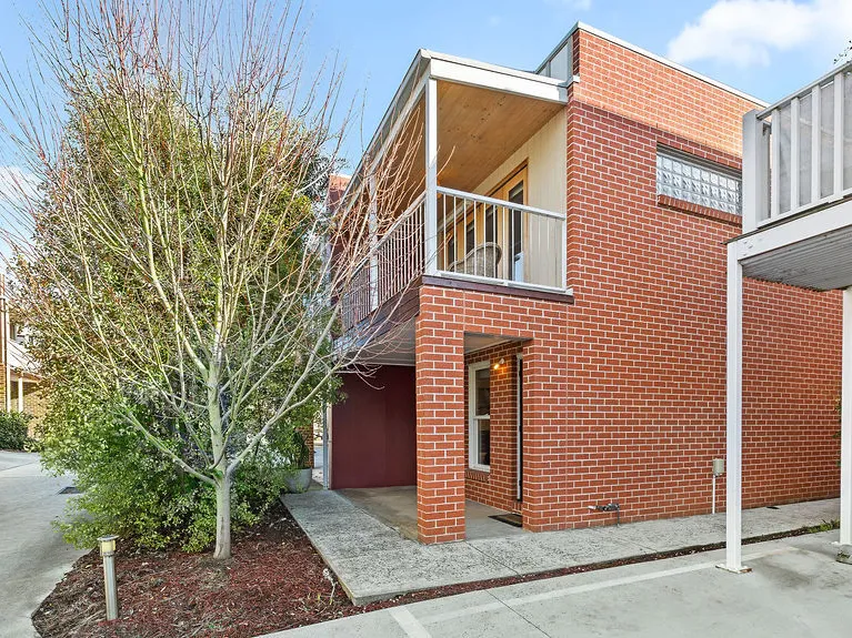 A modern and centrally located two-bedroom townhouse, perfect for someone seeking the convenience of inner-city living.