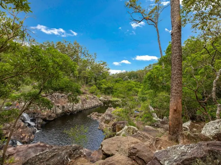 A Riverfront Acreage with Private Swimming Holes and Waterfall. Build Your Dream Acreage Home!