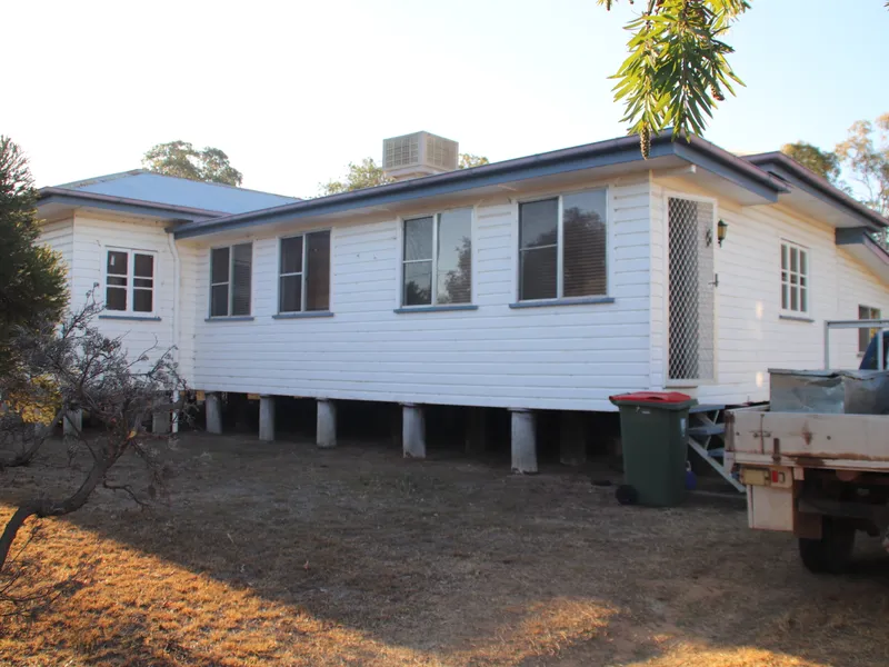 Spacious family home with large shed or ideal investment opportunity