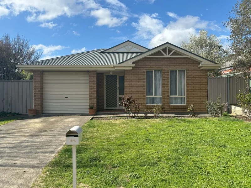 Neat & Functional living, Great Location!