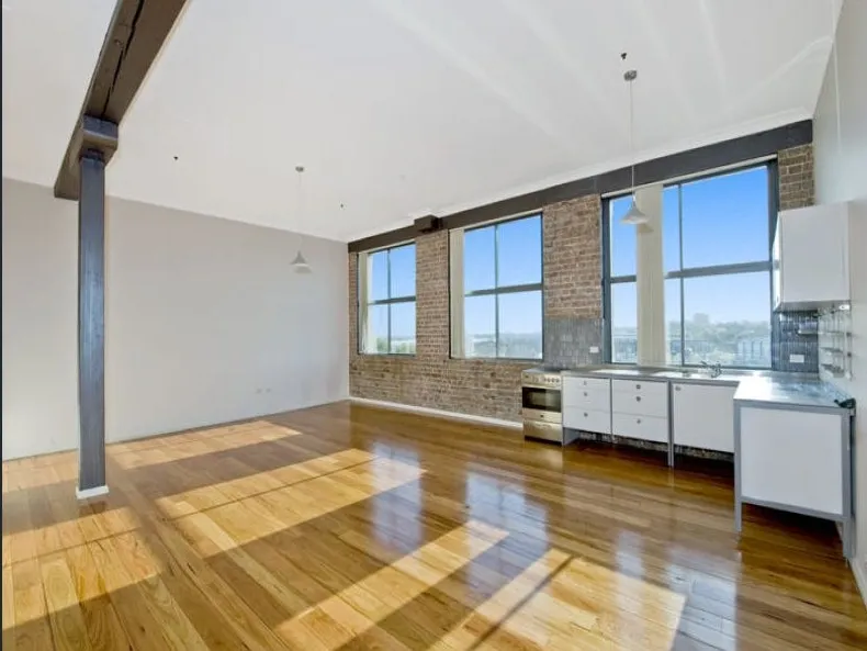 Warehouse style two bedroom apartment with parking.